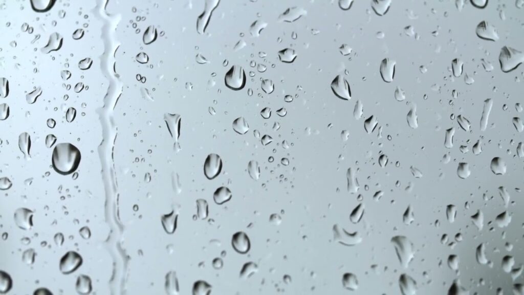 Raindrops on Glass – Nikos